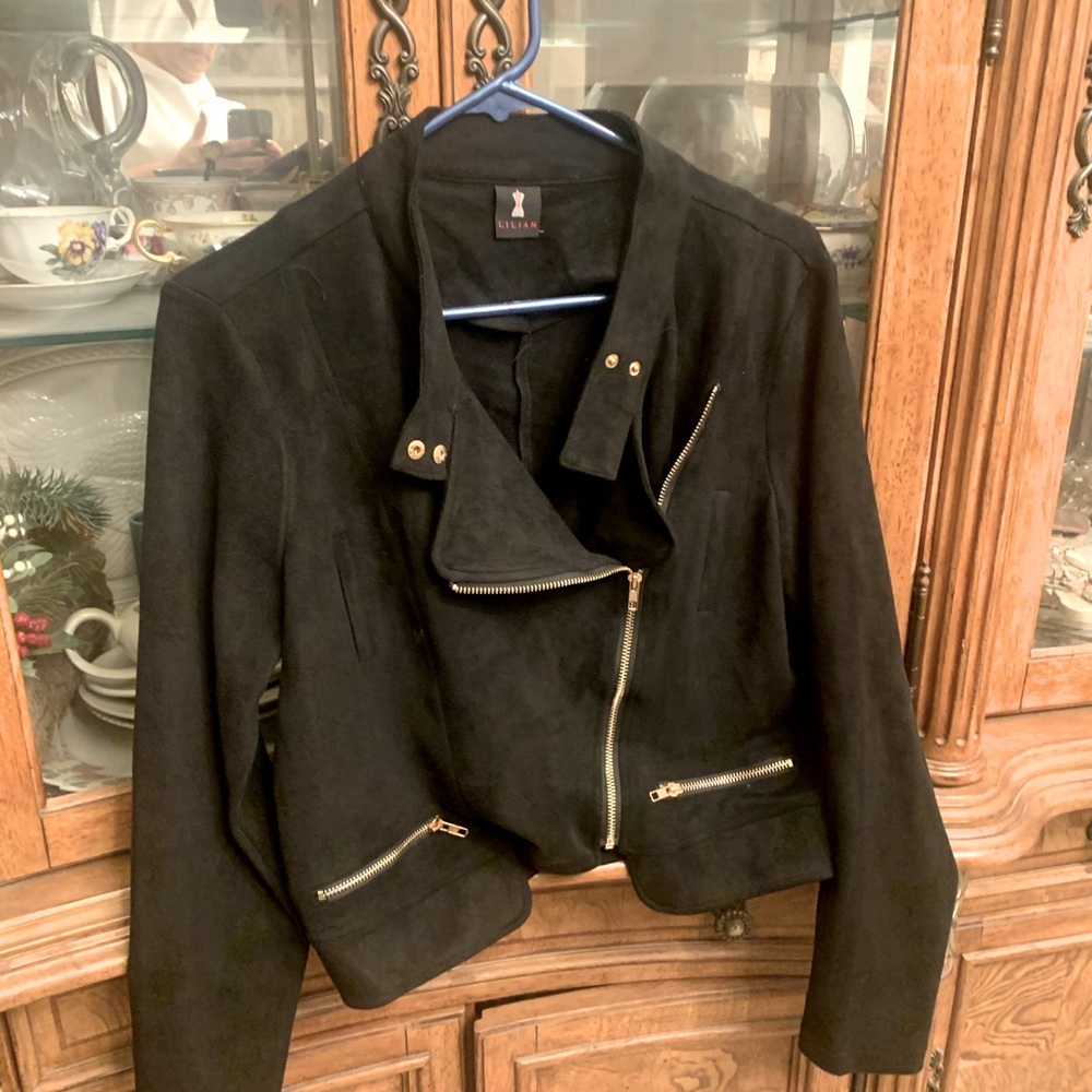 faux suede black jacket with gold zipper. New no tags  never worn.  Runs small